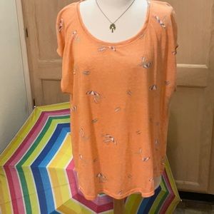 Umbrellas on a soft orange scoop neck tshirt